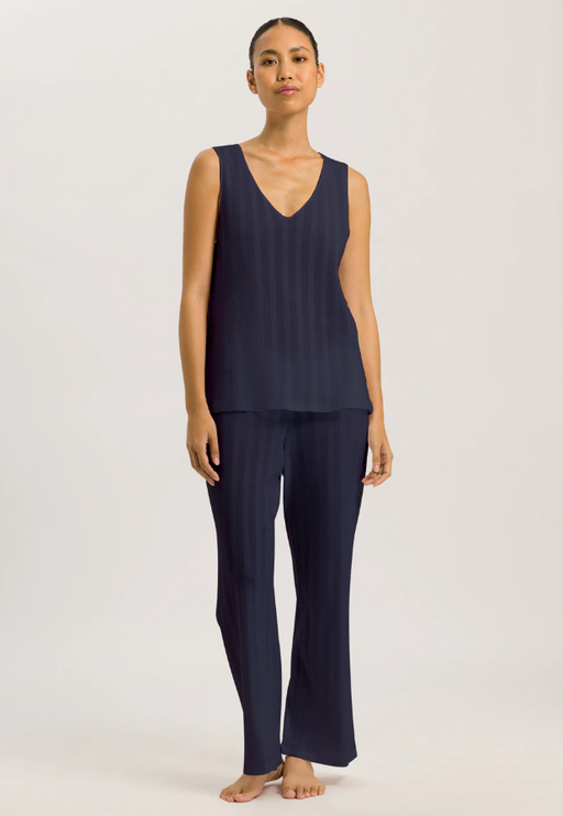 A woman wearing Hanro deep navy tank cropped pajama
