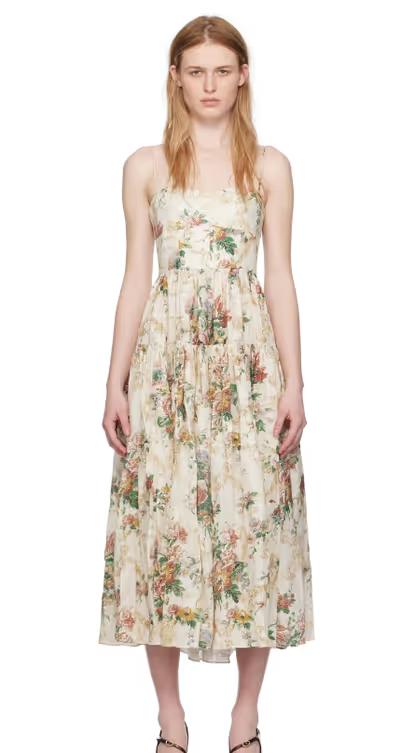 A woman wearing Erdem beige tiered midi dress