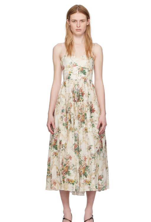 A woman wearing Erdem beige tiered midi dress