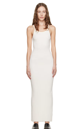 A woman wearing Éterne off-white tank maxi dress