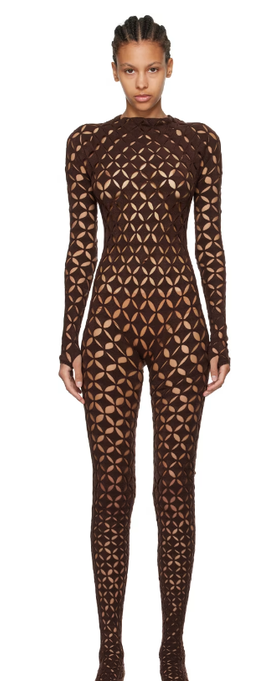 A woman wearing Isa Boulder brown argyle centauri jumpsuit