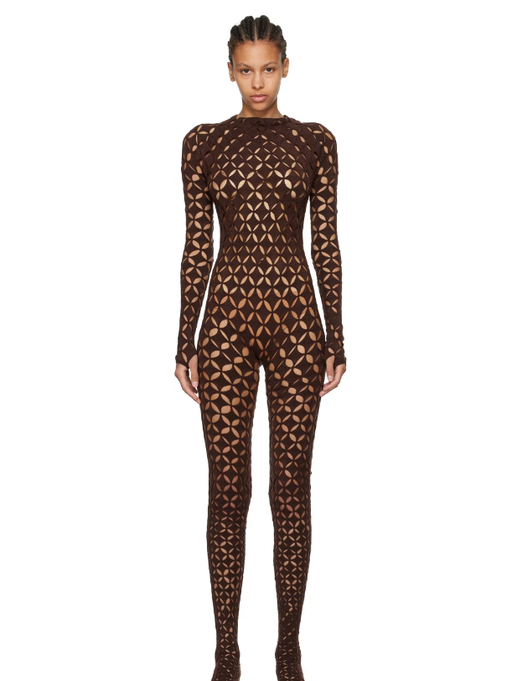 A woman wearing Isa Boulder brown argyle centauri jumpsuit