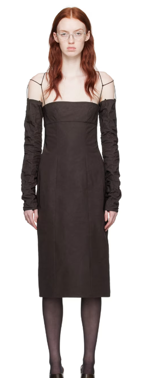 A woman wearing Elena Velez brown straight midi dress