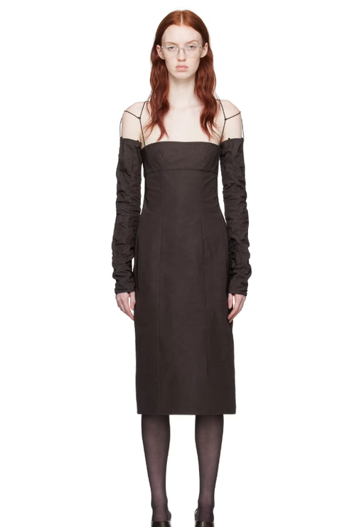 A woman wearing Elena Velez brown straight midi dress