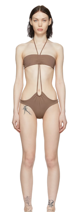 A woman wearing DU CIEL ssense exclusive brown marseille one-piece swimsuit