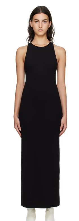 A woman wearing GAUCHERE black ribbed midi dress