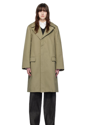 A woman wearing Elleme khaki button coat