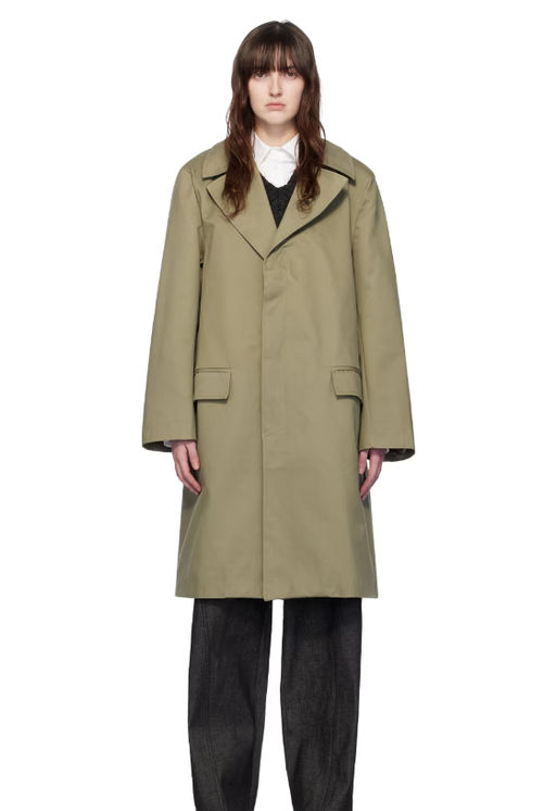 A woman wearing Elleme khaki button coat