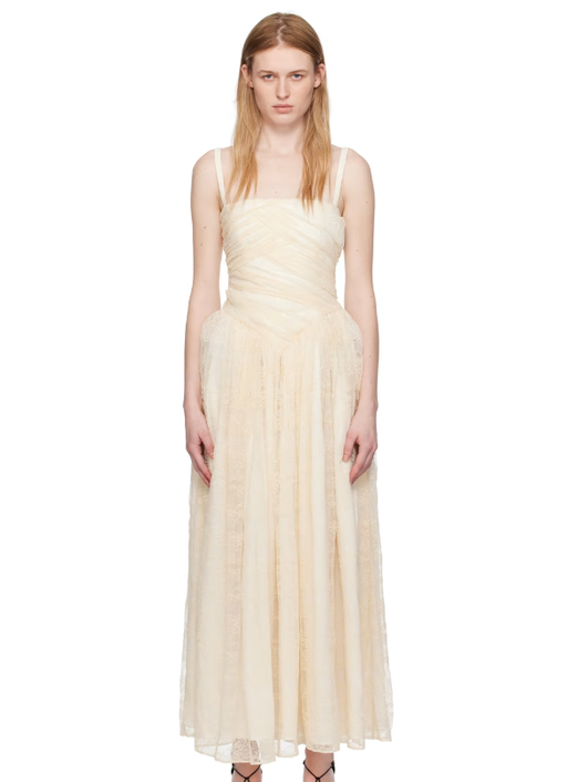 A woman wearing Interior off-white 'the usi' maxi dress