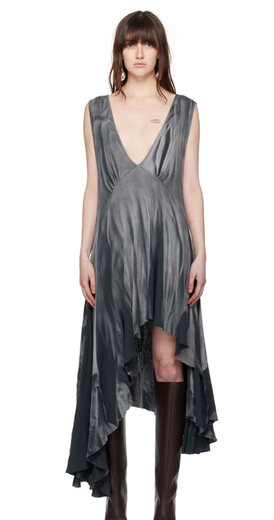 A woman wearing Edward Cuming gray plunging v-neck midi dress