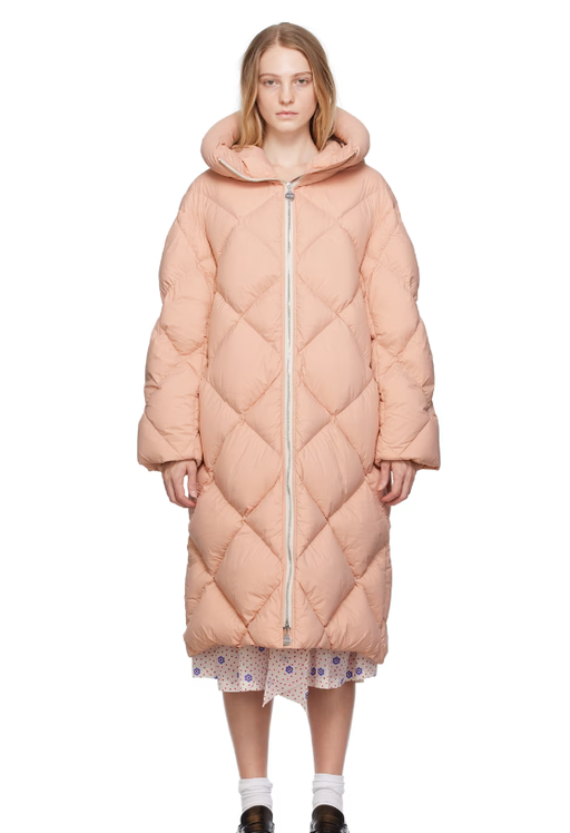 A woman wearing Ienki Ienki  pink rowena down coat