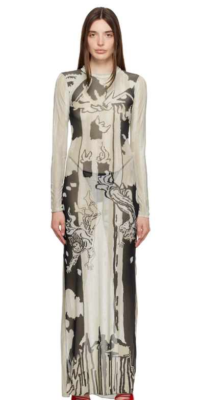 A woman wearing Feben beige & black tower maxi dress