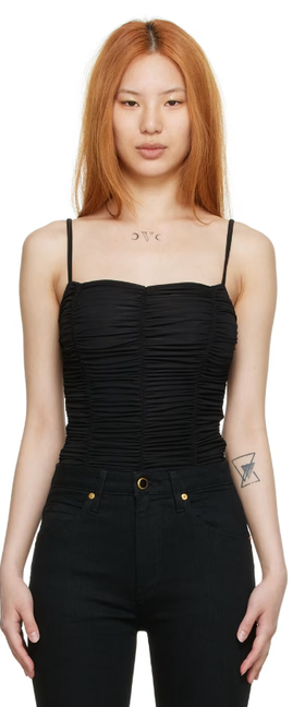 A woman wearing Goldsign black nylon bodysuit
