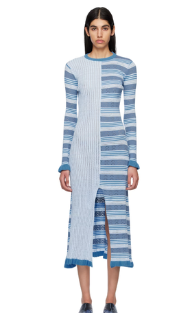 A woman wearing HELMSTEDT blue aninu midi dress