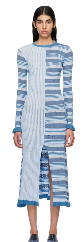 A woman wearing HELMSTEDT blue aninu midi dress