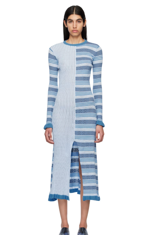 A woman wearing HELMSTEDT blue aninu midi dress