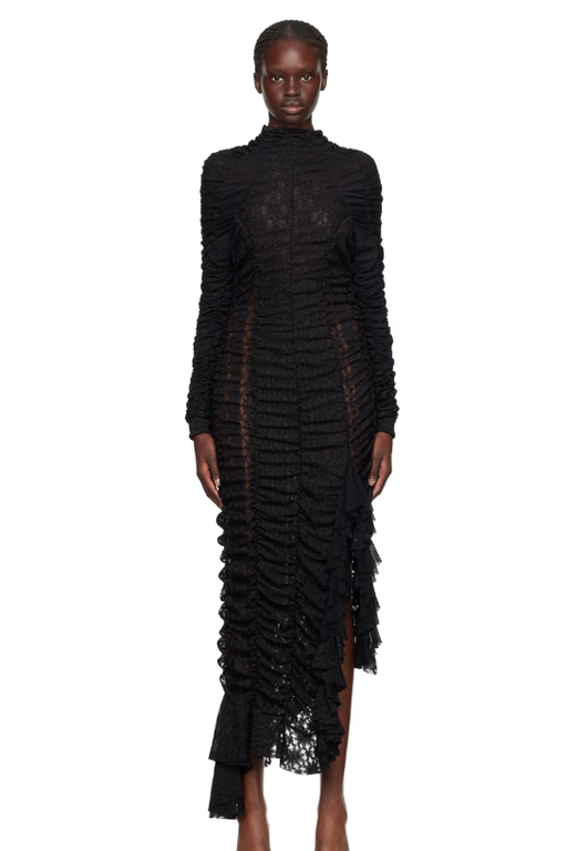 A woman wearing Ester Manas black ruched midi dress