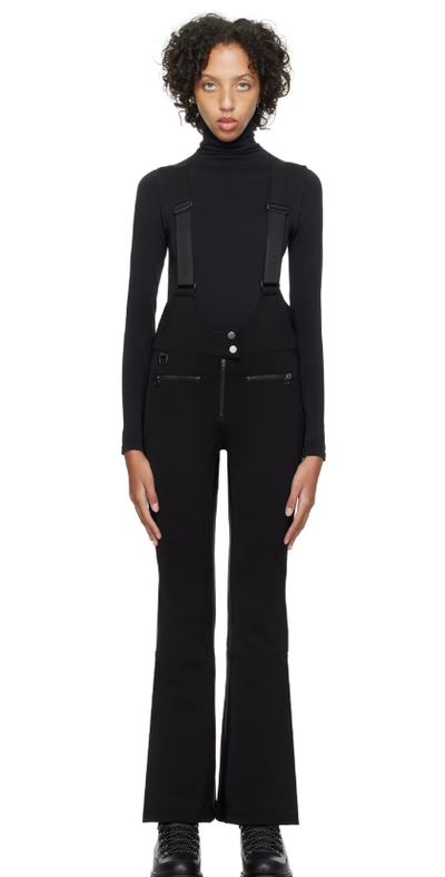 A woman wearing Erin Snow black kris ski pants