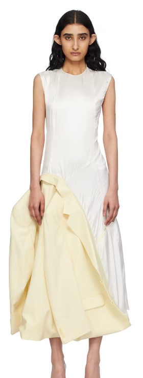 A woman wearing HODAKOVA off-white inside out suit jacket maxi dress