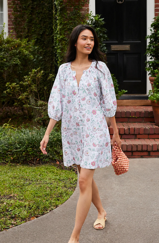 A woman wearing Lake Pajamas garden vines hammock shirt dress in garden vines