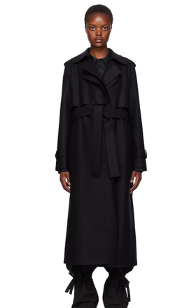 A woman wearing Harris Wharf London black long trench coat