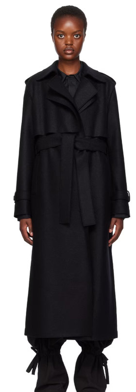 A woman wearing Harris Wharf London black long trench coat
