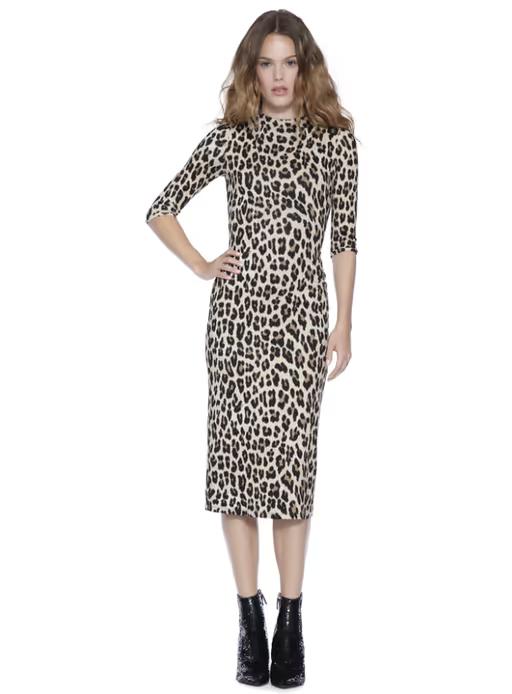 A woman wearing Alice + Olivia delora fitted mock neck midi dress