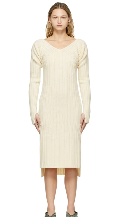A woman wearing DETERM; off-white collagen sleeve knit dress