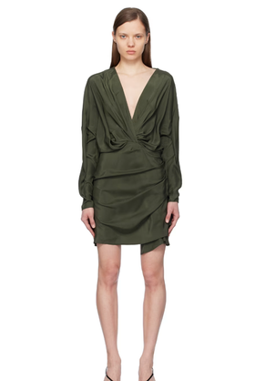 A woman wearing Gauge81 green asuka minidress