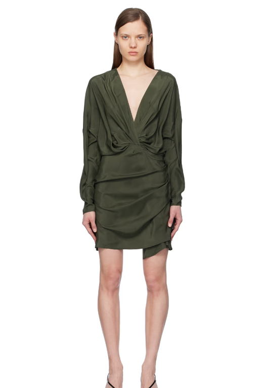A woman wearing Gauge81 green asuka minidress