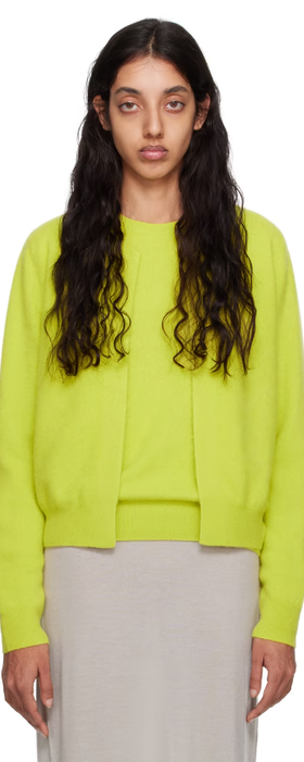 A woman wearing Frenckenberger yellow mini bomber cardigan