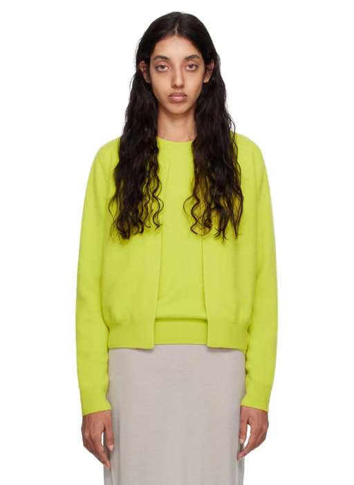 A woman wearing Frenckenberger yellow mini bomber cardigan