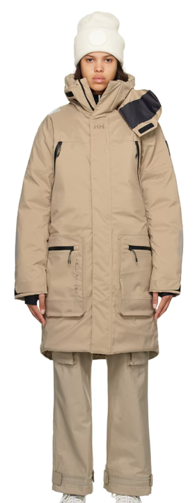 A woman wearing HH-118389225 beige arc ins flow down jacket