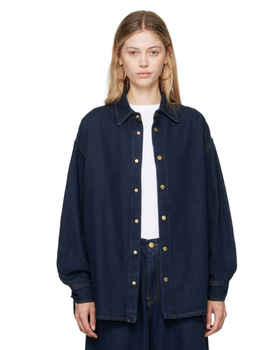 A woman wearing DARKPARK blue keanu denim shirt