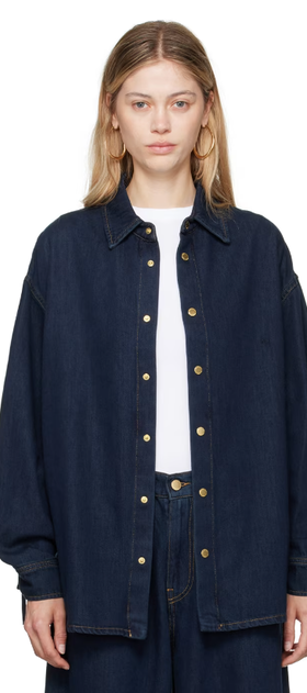 A woman wearing DARKPARK blue keanu denim shirt