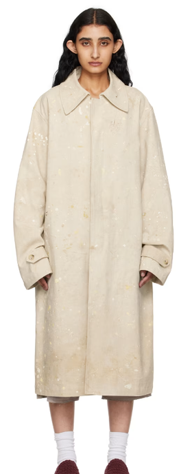 A woman wearing CARTER YOUNG off-white drop-cloth chore coat
