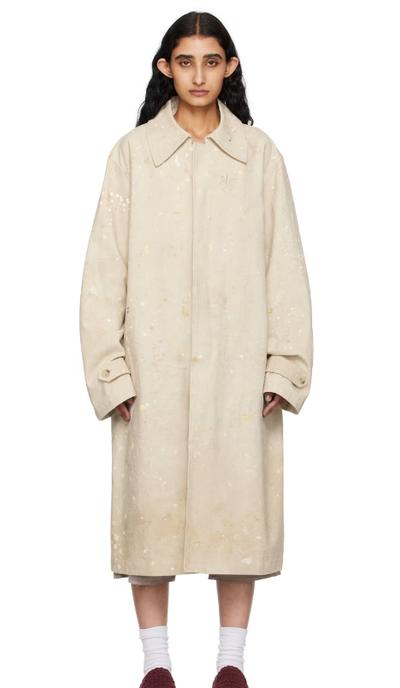 A woman wearing CARTER YOUNG off-white drop-cloth chore coat
