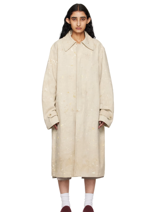 A woman wearing CARTER YOUNG off-white drop-cloth chore coat