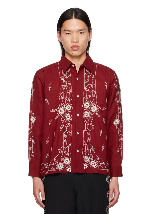 A man wearing Harago burgundy embroidered shirt