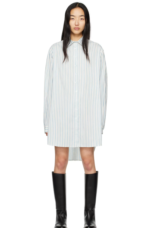A woman wearing ANNA QUAN white jack minidress