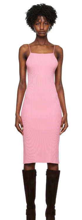 A woman wearing AERON pink zero104 midi dress