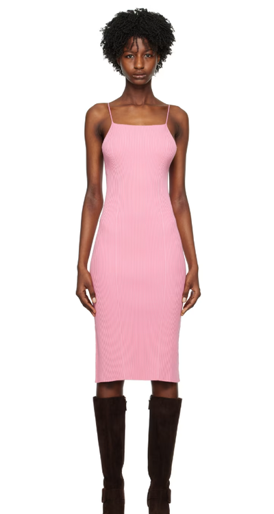 A woman wearing AERON pink zero104 midi dress