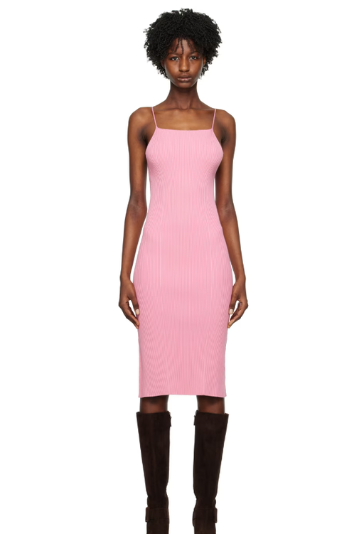 A woman wearing AERON pink zero104 midi dress