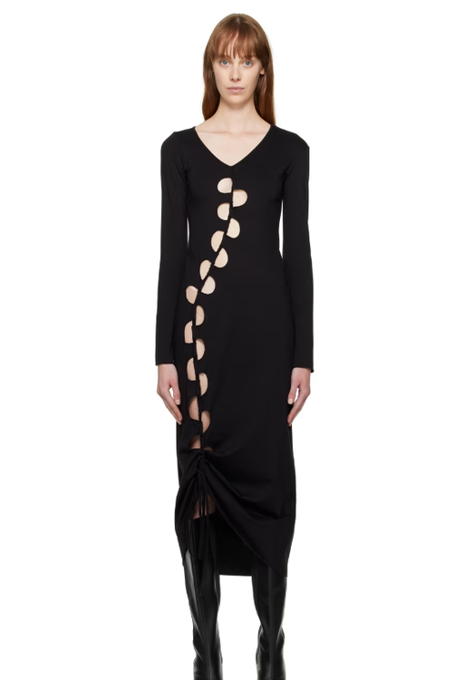 A woman wearing AVAVAV black cutout maxi dress