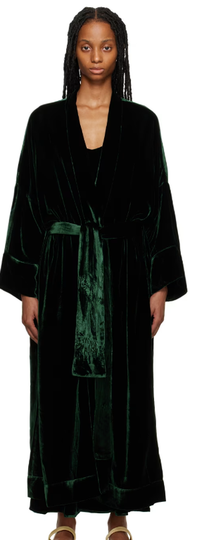 A woman wearing ASCENO green athens robe