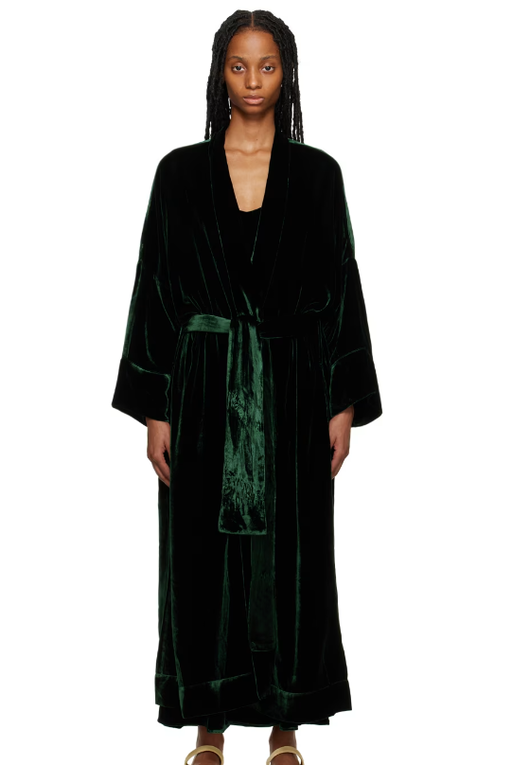 A woman wearing ASCENO green athens robe