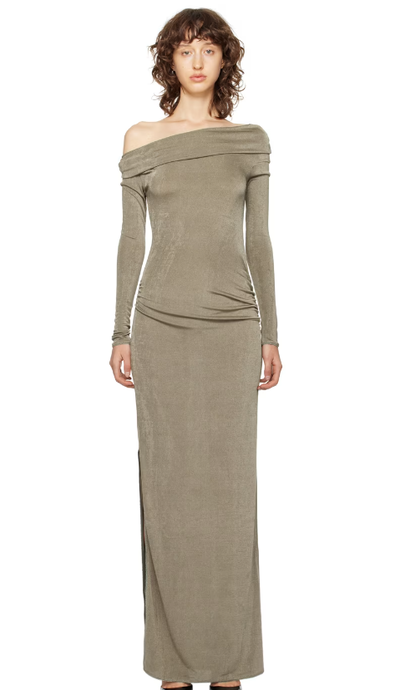 A woman wearing ANNA OCTOBER gray teresa maxi dress