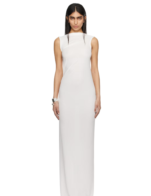 A woman wearing AARON ESH white gathered maxi dress