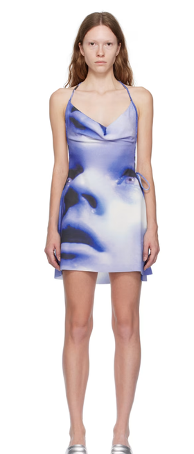 A woman wearing 1XBLUE blue leo minidress