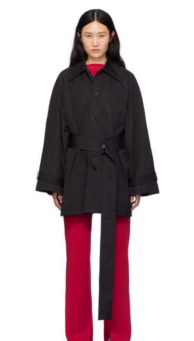 A woman wearing BIRROT black car coat